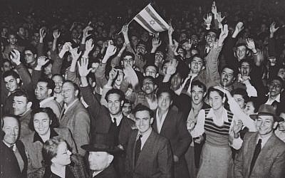 Crowds in Tel Aviv celebrate the UN's vote for partition in 1947 (Courtesy of the Government Press Office, Jerusalem. Photographer: Hans Pinn)
