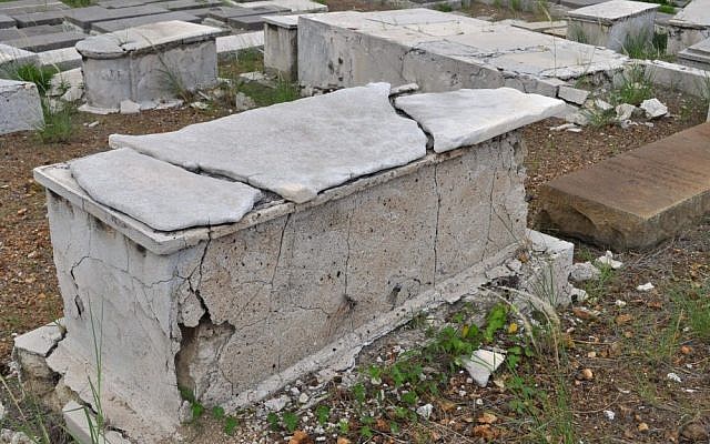 A crumbling tomb stands in the Beth Haim cemetery on the outskirts of Willemstad, Curacao (photo credit: AP/Karen Attiah)