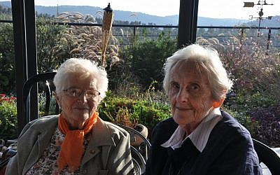 Anne Marie Steiner, 'Nemca,' and Judith Shaked sat outside last week. It was their first meeting in dozens of years. The two girls were best friends during their time in Denmark. (photo credit: Michal Shmulovich/ToI)