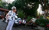 An elderly Israeli woman keeping it real on the streets of Ramat Gan (photo credit: Chen Leopold/Flash90/File)