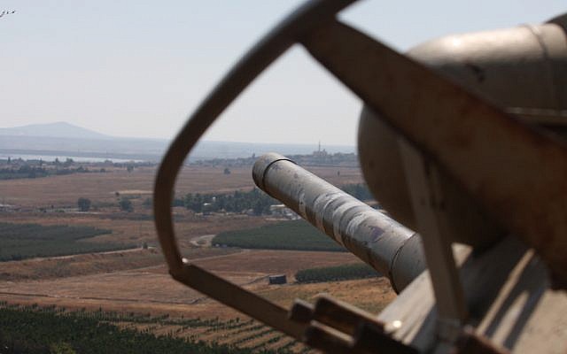 An Israeli tank overlooks the demilitarized zone from the Golan Heights (photo credit: Yossi Zamir/Flash90) An Israeli tank overlooks the demilitarized zone from the Golan Heights (photo credit: Yossi Zamir/Flash90)