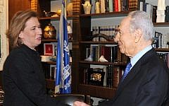 Tzipi Livni and Shimon Peres meeting in 2009. (photo credit: Moshe Milner/GPO)