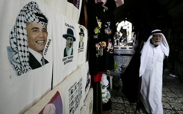 A T-shirt on sale in Jerusalem's old city depicts Obama donning traditional Arab headgear (photo credit: Abir Sultan/Flash 90)
