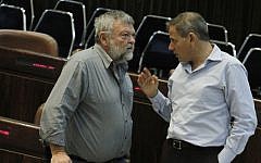 Meretz MK Ilan Gilon, left, speaks with fellow party member Nitzan Horowitz in the Knesset last November (photo credit: Miriam Alster/Flash90)