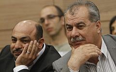Former MK Mohammad Barakeh (right) and lawmaker Masoud Ganaim, pictured in April, 2012. (Miriam Alster/Flash90)