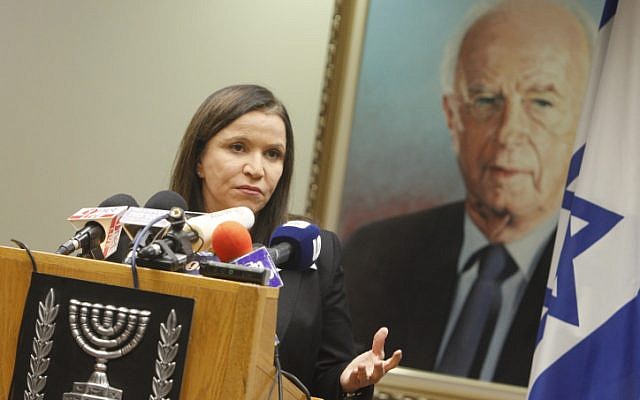Labor Party chairwoman Shelly Yachimovich seen here under a portrait of former prime minister and Oslo Accords signatory Yitzhak Rabin (photo credit: Miriam Alster/Flash90)