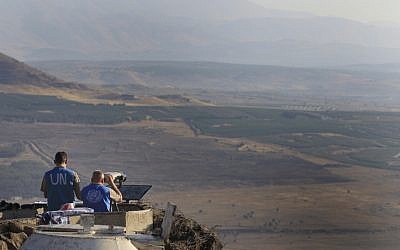 UN peacekeepers monitor the Syrian side of the Golan Heights in July 2012 (Tsafrir Abayov/Flash90)