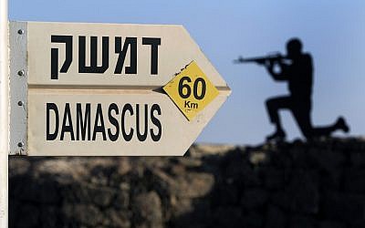 A cutout of a soldier on an army outpost at Mount Bental in the Golan Heights. (photo credit: Tsafrir Abayov/Flash90)