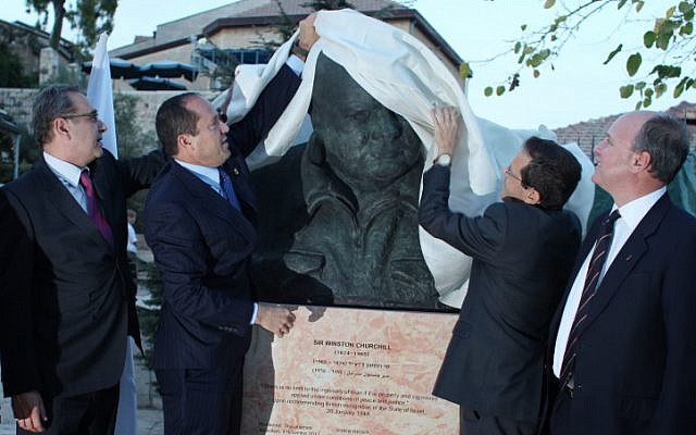 Jerusalem mayor Nir Barkat and Randolph Churchill, grandson of Sir Winston Churchill, unveil a statue depicting the British WWII prime minister in a park overlooking Jerusalem's Old City in honour of 90th anniversary of Churchill's first visit to Israel. November 04, 2012. (photo credit: Yoav Ari Dudkevitch/FLASH90