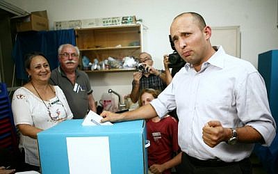 Naftali Bennett casts his vote in his successful campaign to lead the Jewish Home party, in November (photo credit: Yehoshua Yosef/Flash90)