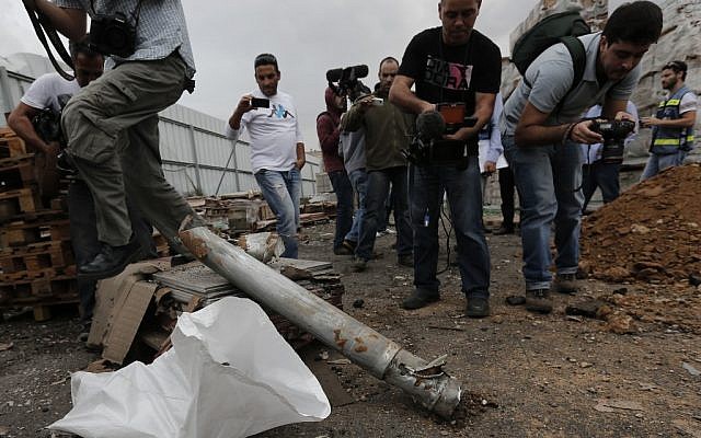 The remains of a rocket that hit a Netivot factory on Monday. (photo credit: Tsafrir Abayov/Flash90) The remains of a rocket that hit a Netivot factory on Monday. (photo credit: Tsafrir Abayov/Flash90)