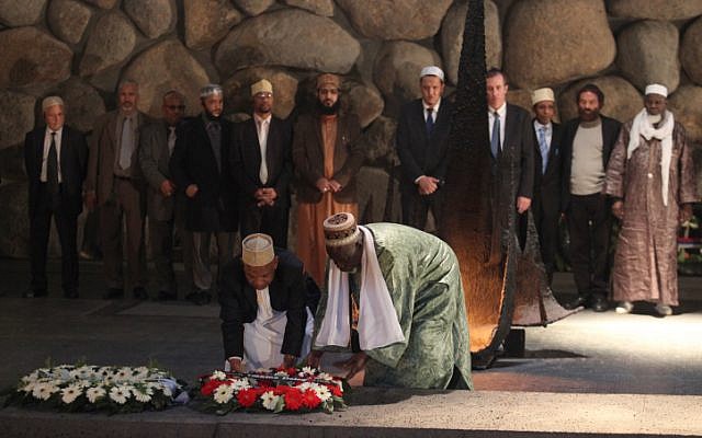 French Imams lay a wreath at the Holocaust memorial site in Yad Vashem, Tuesday (photo credit:  Yoav Ari Dudkevitch/Flash90)