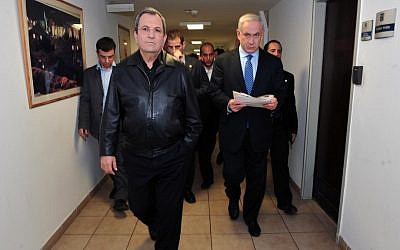 Prime Minister Benjamin Netanyahu (right) and Defense Minister Ehud Barak at the Defense Ministry in Tel Aviv on November 14, 2012. (photo credit: Ariel Hermoni/Ministry of Defense/Flash90)