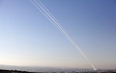 A volley of rockets fired from the Gaza Strip on November 15, 2012. (photo credit: Edi Israel/Flash90)