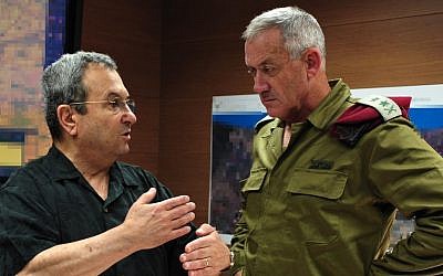 Defense Minister Ehud Barak, left, speaks with IDF Chief of Staff Benny Gantz during a visit to the IDF Southern Command on Thursday (photo credit: Ariel Hermoni/Defense Ministry/Flash90)