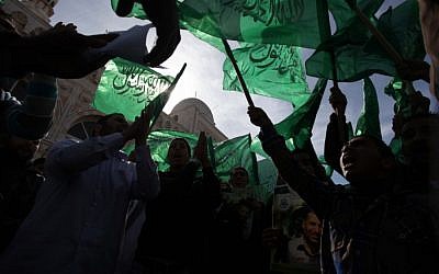 Hamas suporters rally in the West Bank on Friday, November 16 (photo credit: Flash90)