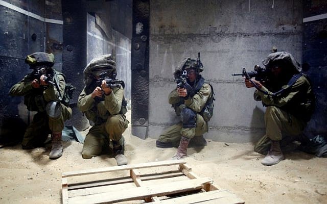 Israeli soldiers attend a training session simulating fighting in Gaza, at an IDF military training base, November 17, 2012. (photo credit: Edi Israel/Flash90) Israeli soldiers attend a training session simulating fighting in Gaza, at an IDF military training base, November 17, 2012. (photo credit: Edi Israel/Flash90)