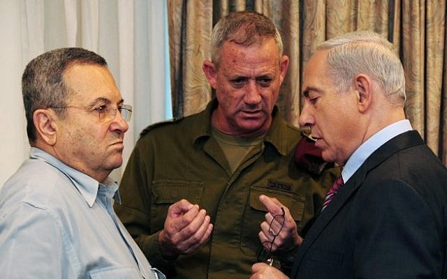 Prime Minister Benjamin Netanyahu, right, speaks with then-IDF chief of staff Lt. Gen. Benny Gantz, center, and then-defense minister Ehud Barak, left, ahead of the weekly cabinet meeting in Jerusalem on November 18, 2012. (Kobi Gideon/GPO/Flash90) Prime Minister Benjamin Netanyahu, right, speaks with then-IDF chief of staff Lt. Gen. Benny Gantz, center, and then-defense minister Ehud Barak, left, ahead of the weekly cabinet meeting in Jerusalem on November 18, 2012. (Kobi Gideon/GPO/Flash90)