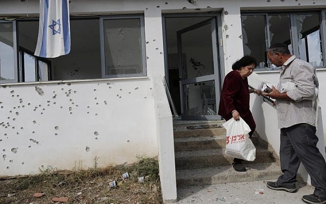 A Be'er Tuvia house hit by a grad rocked fired from the Gaza Strip on Saturday, Nov. 17 (photo credit: Tsafrir Abayov/Flash90) A Be'er Tuvia house hit by a grad rocked fired from the Gaza Strip on Saturday, Nov. 17 (photo credit: Tsafrir Abayov/Flash90)