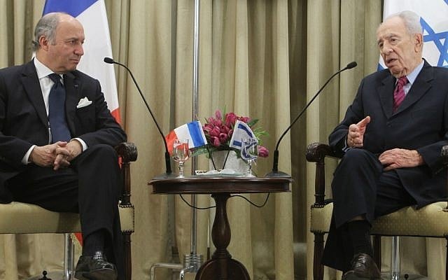 President Shimon Peres meets with French Foreign Minister Laurent Fabius in Jerusalem on Sunday. (photo credit: Miriam Alster/Flash90)