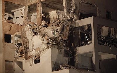 An apartment building in Rishon Lezion that was hit by a Fajr rocket from Gaza on Tuesday evening (photo credit: Miriam Alster/Flash90)