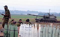A mobile artillery unit positioned outside the northern Gaza Strip on Wednesday. (photo credit: Yozzi Zeliger/Flash90)