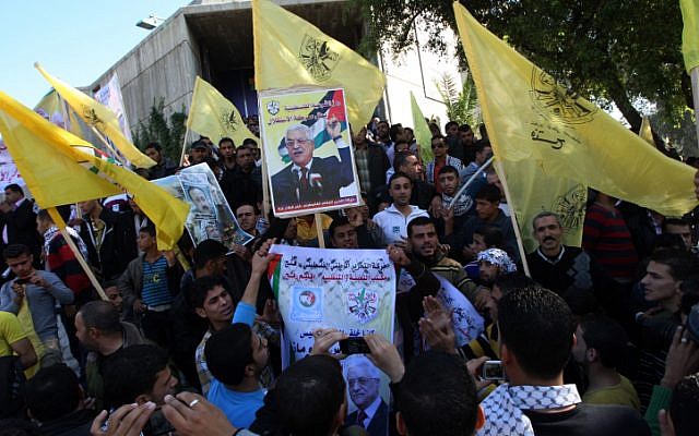 Supporters of Palestinian leader Mahmoud Abbas wave Fatah movement flags during a rally in Gaza City on November 29 (photo credit: Abed Rahim Khatib/Flash90) Supporters of Palestinian leader Mahmoud Abbas wave Fatah movement flags during a rally in Gaza City on November 29 (photo credit: Abed Rahim Khatib/Flash90)