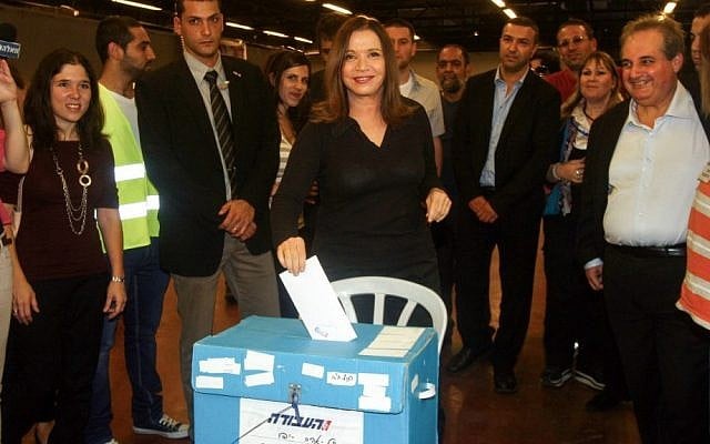 Labor chairman Shelly Yachimovich casts her vote during her party’s central primary convention at a polling station, November 29, 2012. (photo credit: Roni Schutzer/Flash90)
