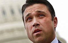 New York Congressman Michael Grimm denies allegations that he worked with an Israeli rabbi and businessman to illegally raise funds for his 2010 campaign. (Jacquelyn Martin/AP)
