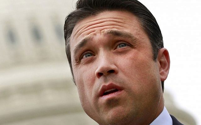 New York Congressman Michael Grimm denies allegations that he worked with an Israeli rabbi and businessman to illegally raise funds for his 2010 campaign. (Jacquelyn Martin/AP) New York Congressman Michael Grimm denies allegations that he worked with an Israeli rabbi and businessman to illegally raise funds for his 2010 campaign. (Jacquelyn Martin/AP)