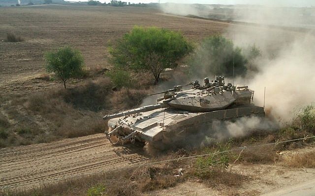 An IDF Merkava tank patrolling along the border with the Gaza Strip. (photo credit: Ilan Ben Zion/Times of Israel staff/File) An IDF Merkava tank patrolling along the border with the Gaza Strip. (photo credit: Ilan Ben Zion/Times of Israel staff/File)