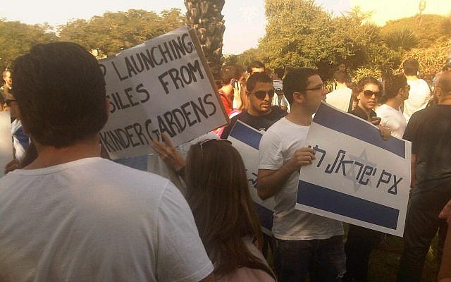 Students at Tel Aviv University hold signs in support of the IDF and Israel's southern residents, Wednesday (photo credit: Aaron Kalman) Students at Tel Aviv University hold signs in support of the IDF and Israel's southern residents, Wednesday (photo credit: Aaron Kalman)