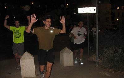 Matt Krieger completes his Jerusalem "Matt-athon" after Hurricane Sandy forced the cancellation of the NYC Marathon (photo credit: courtesy)
