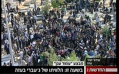 Thousands attend the funeral of slain Hamas military chief Ahmed Jabari, in Gaza, On Thursday, November 15 (screen capture: Channel 2) Thousands attend the funeral of slain Hamas military chief Ahmed Jabari, in Gaza, On Thursday, November 15 (screen capture: Channel 2)