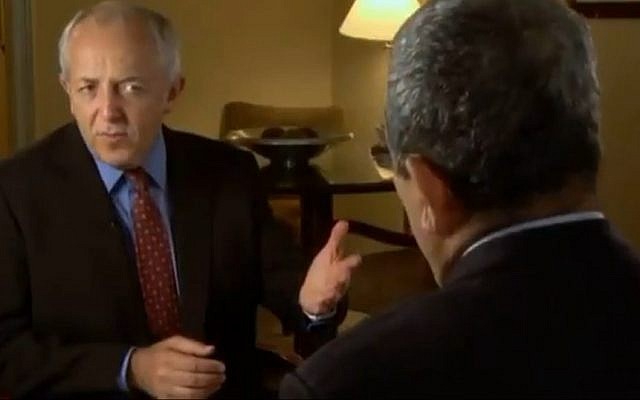 BBC correspondent Jeremy Bowen interviews Israeli defense minister Ehud Barak last year. British protesters claim he slanted his reporting against Palestinians this month during Operation Pillar of Defense. (Photo credit: YouTube screenshot)