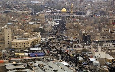 Shi'a and Sunni Muslims make their way to the Imam Husayn Shrine in Karbala, Iraq in 2008, during their pilgrimage in observance of the Arba'een and Ashura holidays. (photo credit: US Navy/Denny C. Cantrell via Wikimedia Commons) Shi'a and Sunni Muslims make their way to the Imam Husayn Shrine in Karbala, Iraq in 2008, during their pilgrimage in observance of the Arba'een and Ashura holidays. (photo credit: US Navy/Denny C. Cantrell via Wikimedia Commons)