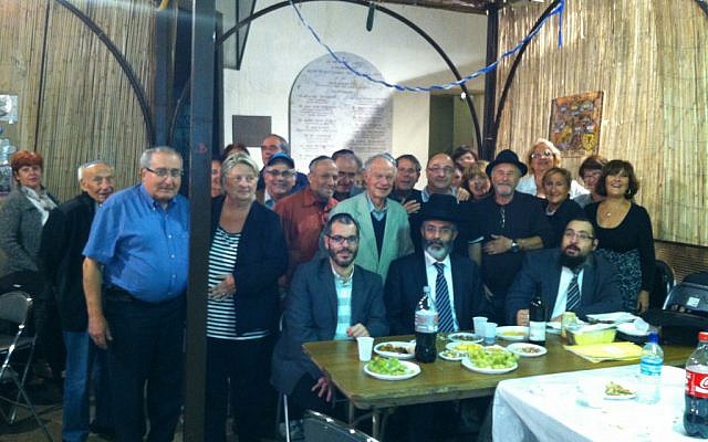 The staff of Marseille's Baskets for Shabbat charity gathers to raise funds during a special program on the city's Jewish radio station. (Courtesy of Paniers de Chabbat via JTA) The staff of Marseille's Baskets for Shabbat charity gathers to raise funds during a special program on the city's Jewish radio station. (Courtesy of Paniers de Chabbat via JTA)