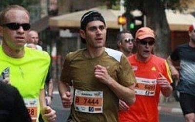 Matt Krieger runs the Tel Aviv half-marathon (photo credit: Courtesy)