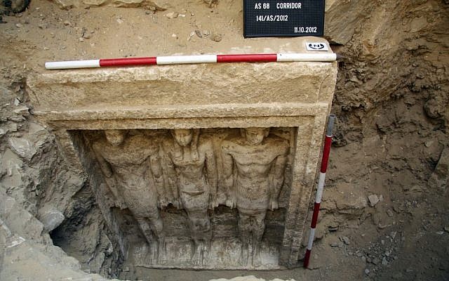 This Thursday,Oct. 11, 2012 photo released Friday, Nov. 2, 2012 by Egypt's Supreme Council of Antiquities, shows recently discovered statues of two men and a woman in a complex of tombs, including one of a pharaonic princess, in the Abusir region, south of Cairo, Egypt (photo credit: AP/Egypt's Supreme Council Of Antiquities)