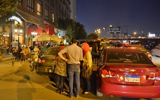 Egyptians congregate outside a Cairo cafe this week. (photo credit: AP) Egyptians congregate outside a Cairo cafe this week. (photo credit: AP)