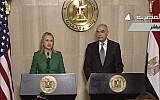 US Secretary of State Hillary Clinton, left, and Egyptian Foreign Minister Mohammed Kamel Amr give a joint news conference announcing a ceasefire between Israel and Hamas in Cairo on Wednesday (photo credit: AP/Egyptian State Television)
