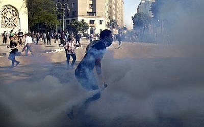 Clashes at Tahrir Square, Cairo, on Wednesday (photo credit: Khalil Hamra/AP)