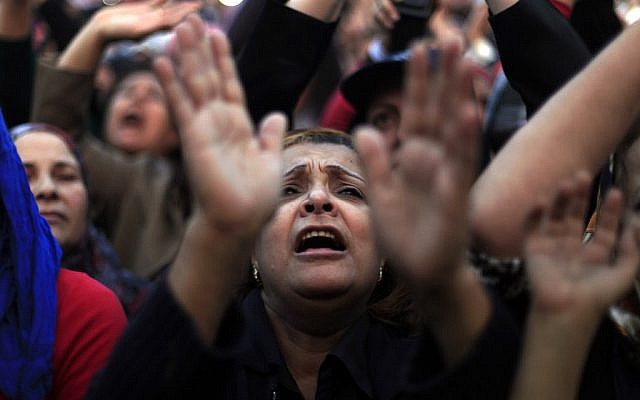 Egyptian protesters chant slogans at rally in Tahrir Square in Cairo, Egypt, Tuesday, Nov. 27, 2012 (photo credit: AP/Khalil Hamra)