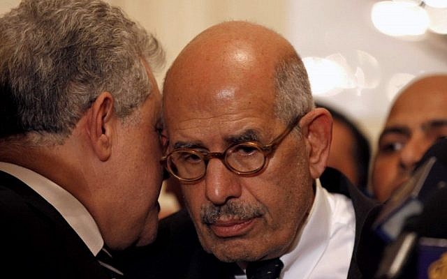 Egyptian pro-democracy figure and the former head of the International Atomic Energy Agency Mohamed ElBaradei, center, is expected to speak Friday at a rally against President Mohammed Morsi's assumption of sweeping new powers. (photo credit: AP/Mostafa El Shemy) Egyptian pro-democracy figure and the former head of the International Atomic Energy Agency Mohamed ElBaradei, center, is expected to speak Friday at a rally against President Mohammed Morsi's assumption of sweeping new powers. (photo credit: AP/Mostafa El Shemy)