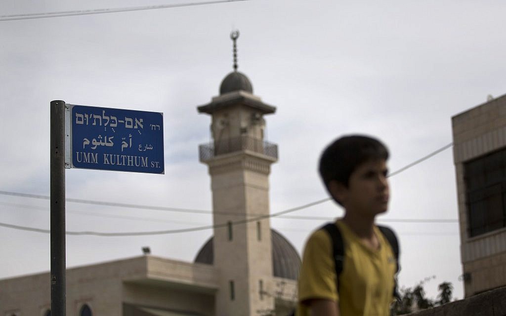 A child walks past the newly-named Umm Kulthum street in East Jerusalem, October 24, 2012 (photo credit: AP/Bernat Armangue) A child walks past the newly-named Umm Kulthum street in East Jerusalem, October 24, 2012 (photo credit: AP/Bernat Armangue)