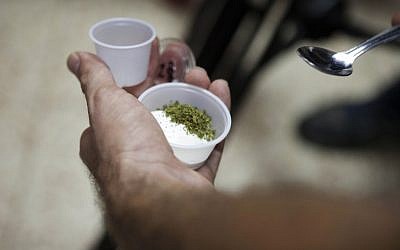 In this Tuesday, Oct. 30, 2012 photograph, medical cannabis with yogurt is served at the old age home in kibbutz Na'an, near the city of Rehovot. (photo credit: AP) In this Tuesday, Oct. 30, 2012 photograph, medical cannabis with yogurt is served at the old age home in kibbutz Na'an, near the city of Rehovot. (photo credit: AP)