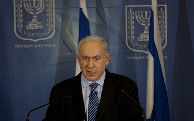 Prime Minister Benjamin Netanyahu announces operation Pillar of Defense at a press conference at the Hakirya military headquarters in Tel Aviv, Wednesday night (photo credit: AP/Ariel Schalit)
