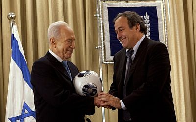 Shimon Peres (left) with Michel Platini in Jerusalem, Thursday (photo credit: Sebastian Scheiner/AP)