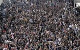 Jordanian Protesters from the Islamic Action Front and other opposition parties hold a demonstration after Friday prayers in Amman, Jordan, Friday, Nov. 16 (photo credit: AP/Raad Adayleh)