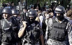 Illustrative photo of Jordanian police (photo credit: AP/Raad Adayleh)